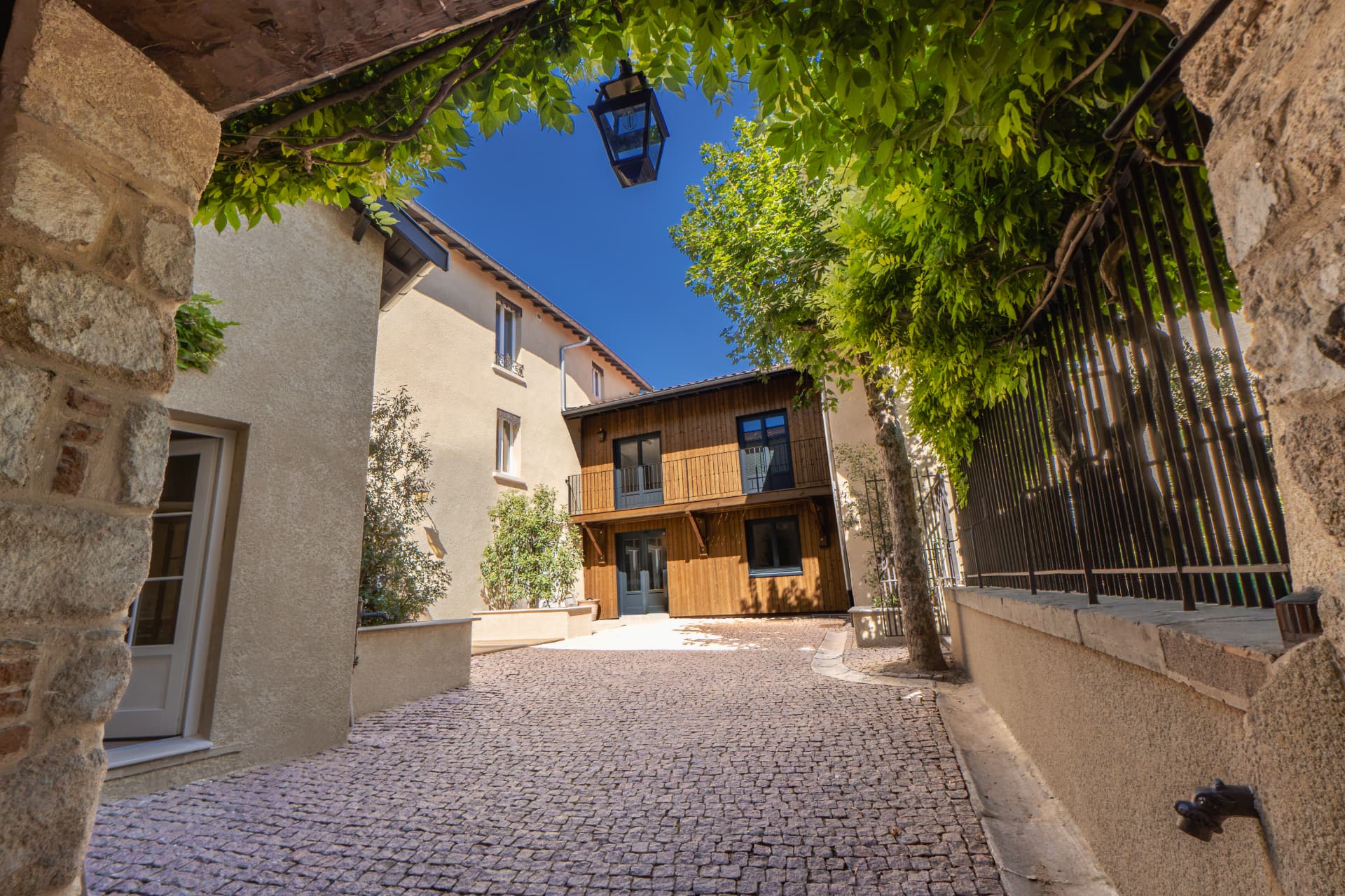 Paved inner courtyard of the Little Door residence